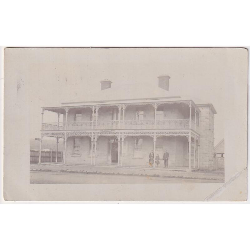 (FE1044) TASMANIA · 1910: real photo card with a view of the COMMERCIAL HOTEL at RICHMOND (now the "Richmond Arms") · postally used from there · corner crease o/wise in excellent condition