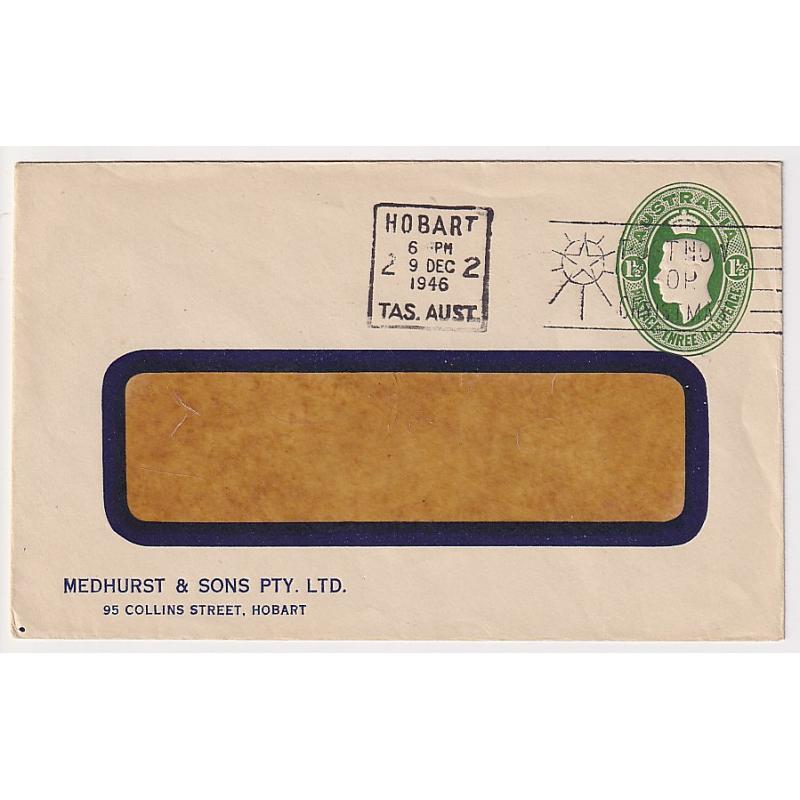 (MK1430) TASMANIA · 1946: used stamped-to-order envelope with oval 1½d green KGVI indicium BW ES 79 used by Medhurst & Sons Pty. Ltd., Hobart · flap unsealed · fine condition