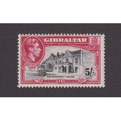 (PR1756) GIBRALTAR · 1944: fresh MLH 5/- black & carmine KGVI pictorial definitive perf.13 SG 129b · very nice condition front/reverse · c.v. £38 (2 images)