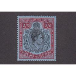 (PR1767) NYASALAND PROTECTORATE · 1938: attractive mint 2/6d black & red on blue KGVI defin SG 140 · c.v. £18 (2 images)