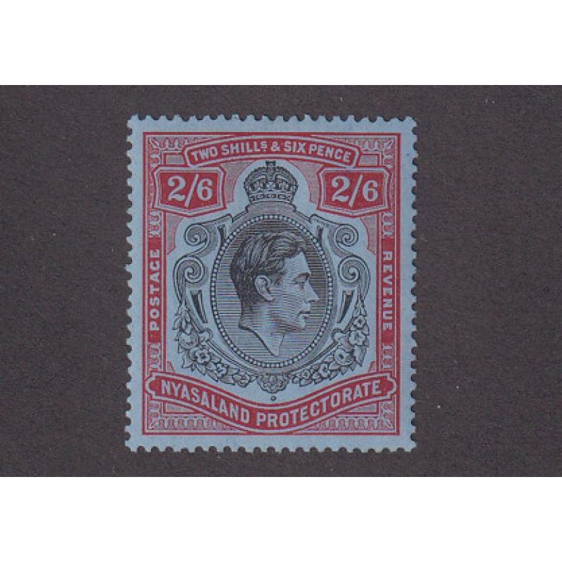 (PR1767) NYASALAND PROTECTORATE · 1938: attractive mint 2/6d black & red on blue KGVI defin SG 140 · c.v. £18 (2 images)