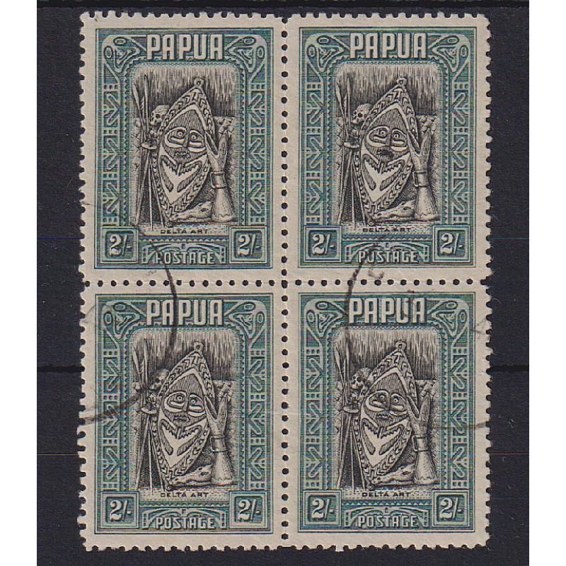 (ST1004) PAPUA · 1932: nicely used block of 4x 2/- black & slate-green pictorial defins SG 141 · fine condition · total c.v. £104 (4)