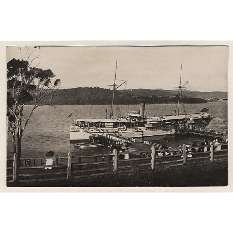 (WW15104) TASMANIA  · c.1920: real photo card by an unidentified photographer with a view of a large steam yacht at the Hobart regatta grounds · original photo probably pre-dates this print by about 15 years · fine condition