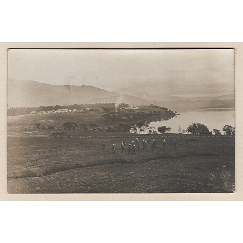 (WW15217) TASMANIA  · c.1916: unused real photo card by Beattie Studios with a view of men training with rifles at CLAREMONT MILITARY CAMP  · VF condition